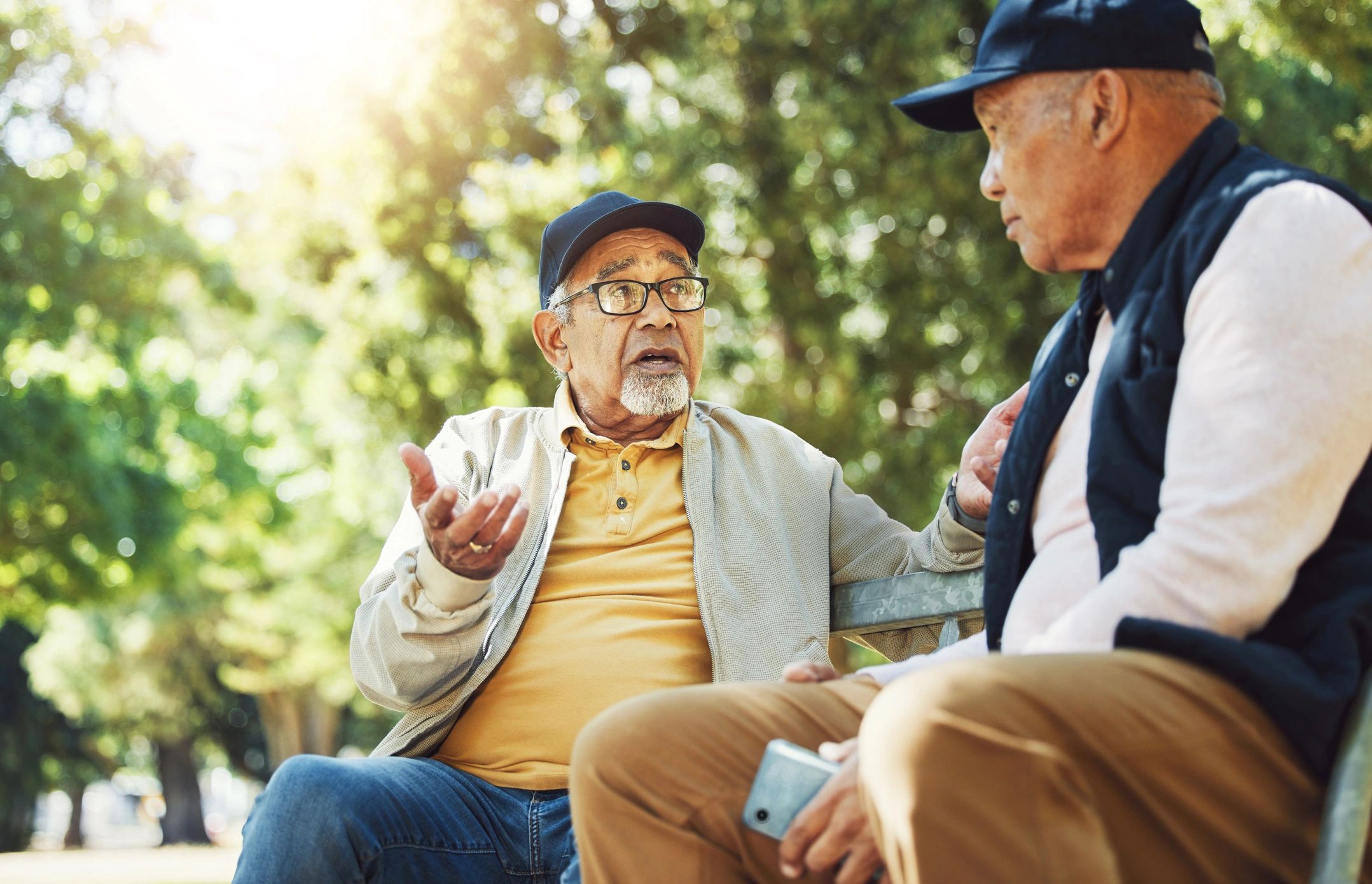 senior men sharing stories