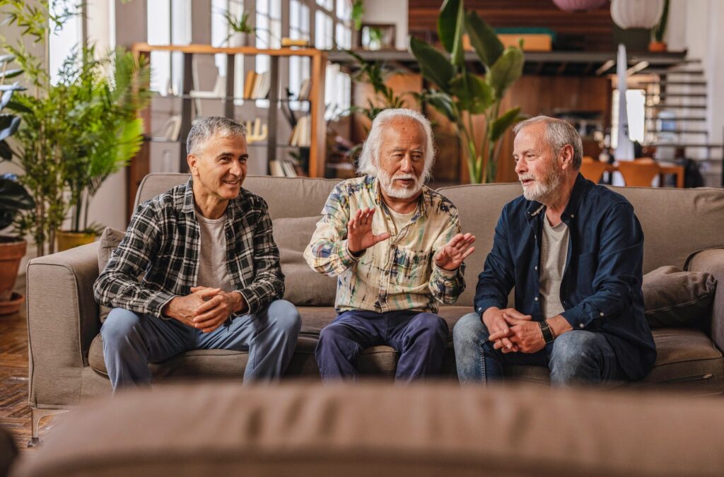 senior men sharing stories